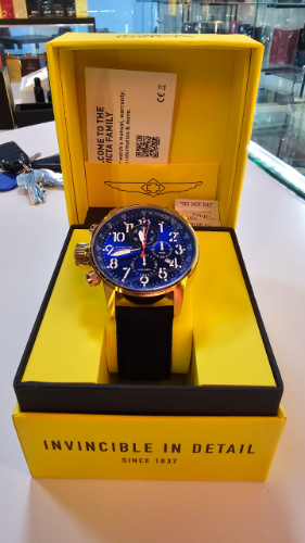 Reloj Invicta Dorado con Azul