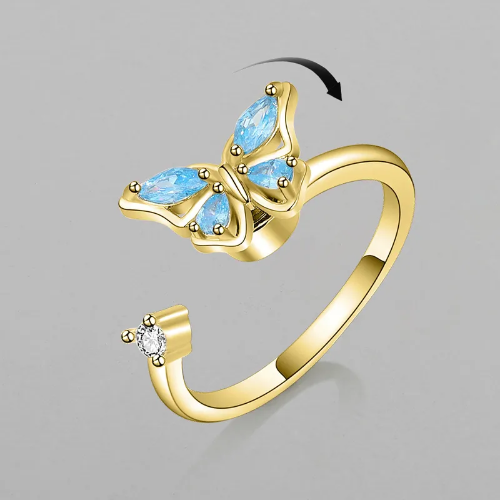 Estilo Giratorio Antiestres mariposa azul - Dorado - ANI023