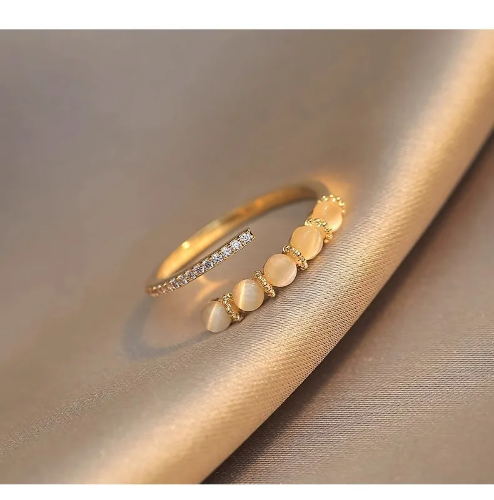 Anillo ajustable con microdiamantes y circoneas - Dorado - ANI131