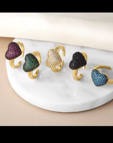 Anillo ajustable forma de corazon con brillos varios colores