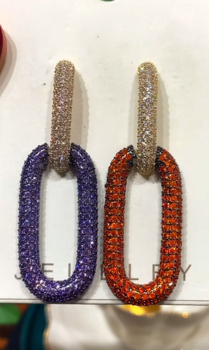 Pendientes de circulos y ovalos brillantes varios colores