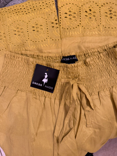Pantaloneta amarilla DRESS NADO