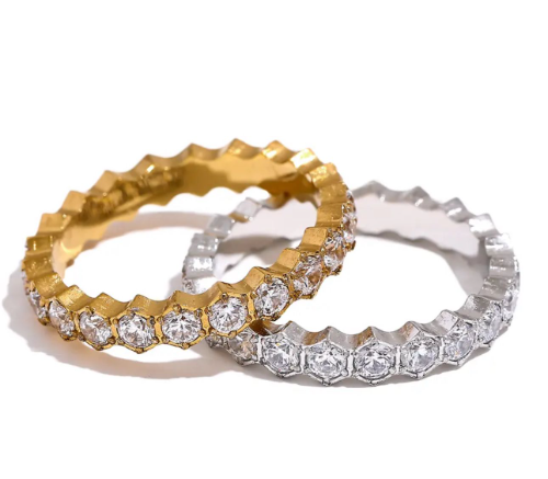Anillo dorado y plateado con circonia