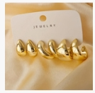 aretes de gota dorado