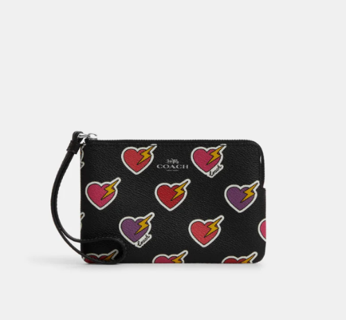 Muñequera negro corazones coach