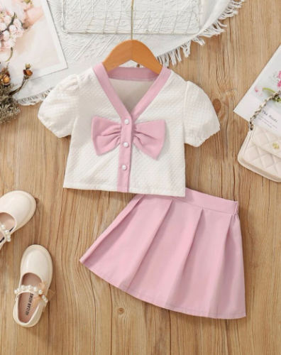 CJ FALDA ROSA GALLETA -BLUSA BLANCA  MOÑO