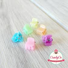 Broches chiquitos de colores con brillos