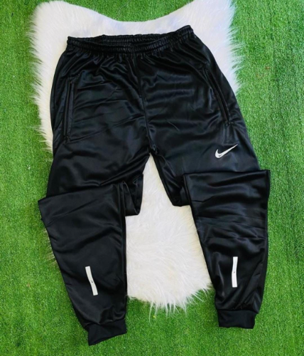 T: P Calça nike refletiva preta @
