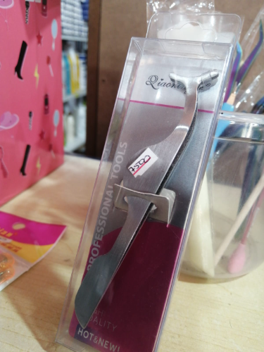 pinza para colocar pestañas de tira